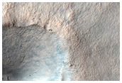 Crater with Thin Ejecta Southeast of Icaria Planum

