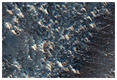 Lava Cut by Trough in Syria Planum
