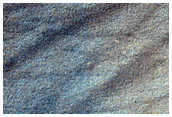 Edge of Mesa on Plains Surrounding Sisyphi Montes
