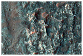 Crater Remnant on Floor of Ladon Valles Basin
