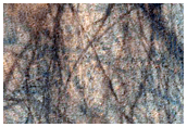Southern High-Latitude Mesa in Mariner 9 Das 6173723 and 7648483
