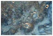 Small Crater North of Hellas Planitia with Phyllosilicate-Rich Ejecta
