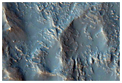 Possible Prehnite or Chlorite-Rich Terrain on Large Crater Floor
