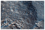 Dipping Layers Against Mound in Deuteronilus Mensae
