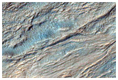 Monitor Gullied Slopes of Impact Crater
