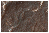 Light Toned Material in Northern Hellas Region
