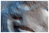 Dipping Layers Against Mound in Semeykin Crater
