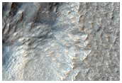 Terraced Crater in Southern Mid-Latitudes

