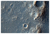Possible Flow Material at Bakhuysen Crater Rim
