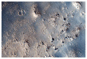 Curved Ridge in Tartarus Montes Region
