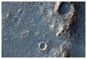 Possible Flow Material at Bakhuysen Crater Rim
