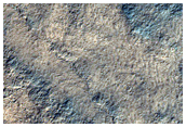 Carbon Dioxide Erosion on Rugged Terrain

