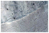 Steep-Front Deposit on Crater Floor in Northern Arabia Terra