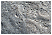 Lineated Valley Floor Material in the Coloe Fossae
