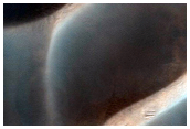 Intracrater Dune Field and Associated Extracrater Dark Streak
