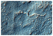Fan-Shaped Group of Ridges Northwest of Hellas Planitia

