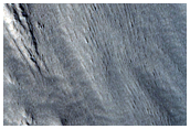 Multiple Curved Ridges at End of Valley in Protonilus Mensae
