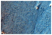 Flows in North Argyre Planitia Rim
