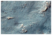Western Continuous Ejecta of Istok Crater in Thaumasia Fossae
