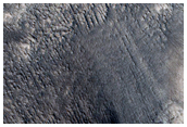 Exit Breach in Well-Preserved Crater
