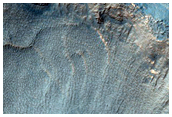 Flows in Adjacent Craters in Promethei Terra
