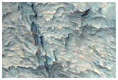 Exposure of Layered Bedrock Northwest of Hellas Planitia