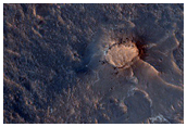 Light-Toned Deposits on Floor of Orson Welles Crater
