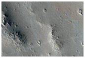 Candidate Recent Impact Site on Uranius Mons
