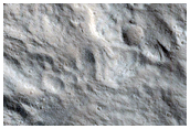 Layers in Troughs in Acheron Fossae
