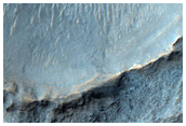 Diverse Landforms in Crater Basin in Noachis Terra