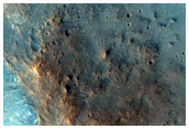Clay-Rich Deposits Possibly Associated with Nif Crater
