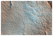 Cracks on Mid-Latitude Crater Floor
