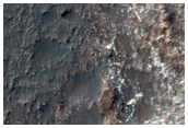 Light-Toned Outcrops in Simois Colles Basin 
