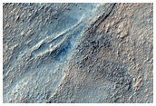 Possible Acid Leaching in Crater-Fill Deposits in Hellas Planitia
