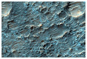 Possible Exposed Bedrock on Crater Floor
