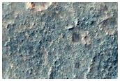 Light-Toned Fill in Young Valleys along Gorgonum Chaos Basin Floor
