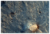 Light-Toned Deposits on Floor of Orson Welles Crater
