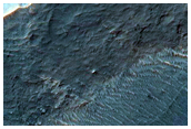 Light-Toned Deposits in Valley and Crater North of Eberswalde Crater
