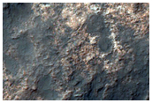Dark-Toned Material Above Light-Toned Material in Gorgonum Chaos Basin
