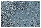Layering in Walls in Depression in Nereidum Montes
