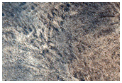 Light-Toned Deposits along Northern Melas Chasma Floor
