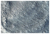 Arc-Shaped Ridges at Valley Base in Protonilus Mensae
