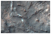 Butte Mesa and Sinuous Ridge-Forming Material in Terra Cimmeria

