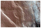 Monitoring of Steep Scarp in North Polar Layered Deposits Trough
