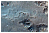 Pits on Crater Floor in Southern Mid-Latitudes
