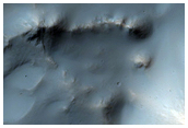 Impact Crater with Central Structure in Terra Sirenum
