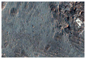 Light-Toned Layered Deposits along Floor of Ladon Valles
