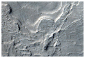 Faecea strataque deposita in cratere in Arabia Terra