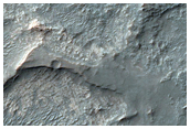Semi-Sinuous Ridges at Crater Wall-Floor Interface
