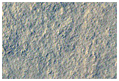 Contacts between Stratified Materials
